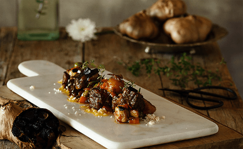 Venision stew with black garlic, mushrooms and chesnuts