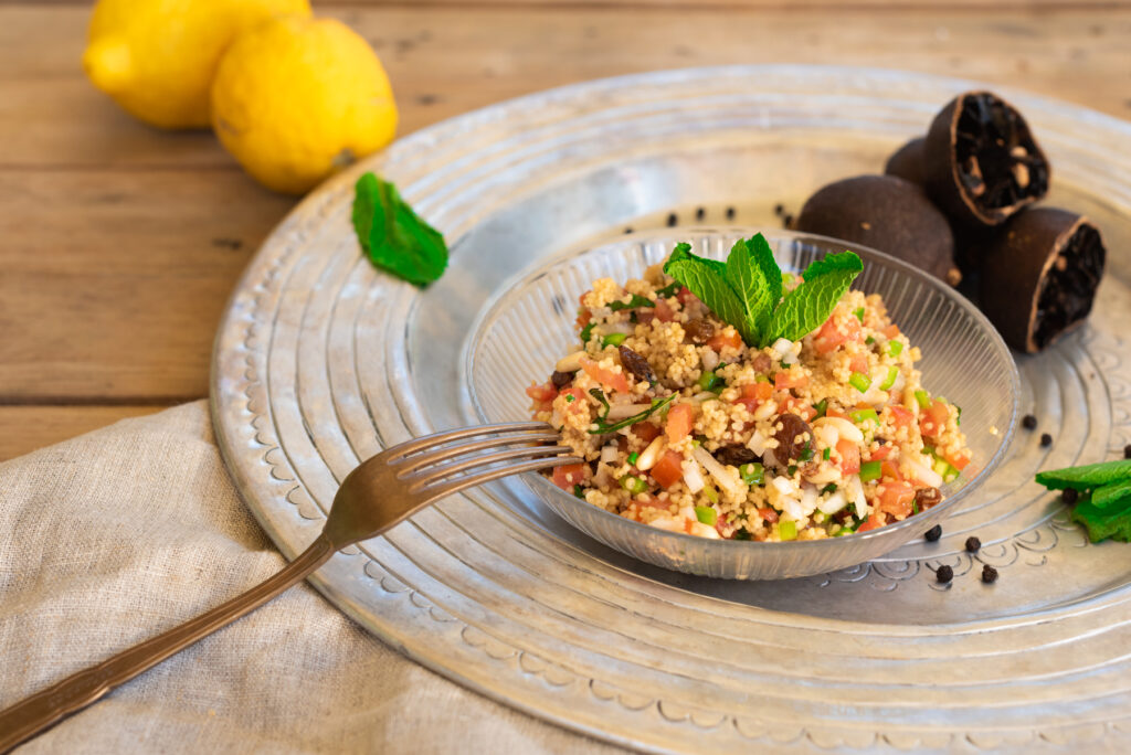 Tabbouleh salad with pine nut and black lime powder vinaigrette